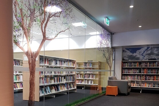 vinyl graphics jacaranda trees and clouds toowong children's library